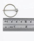 Locking Pins Kit Four Pack One Eighth Inch By One Inch Stainless Steel Lynch Pins With Ring next to ruler showing size