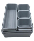 8 Piece Interlocking Drawer Organizer Trays Set in Light Gray Plastic, modular storage bins stacked view