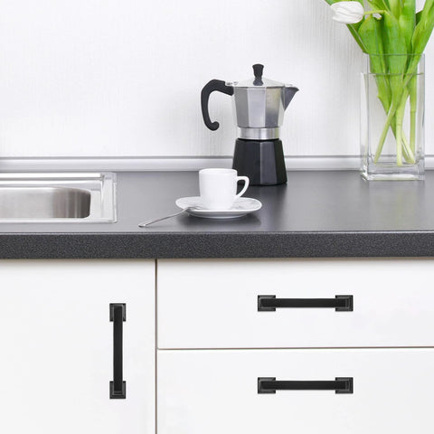Kitchen with 10 Pack Matte Black 5 Inch 128mm Cabinet Handles Zinc Alloy Drawer Pulls installed on white cabinets and drawers.