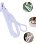Electric Fabric Scissors Handheld Cutting Shears Cordless Multipurpose Sewing Tool For Quilting Tailor Work Portable White on a cutting surface.