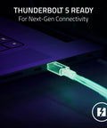 Flex Your Desk With This Thunderbolt Five Dock Offering Eleven Ports And An M2 Ssd Slot For Smooth Multi Monitors And Quick Laptop Power Ups That Never Bog Down Your Workflow, glowing cable connected to a laptop for next-gen connectivity.