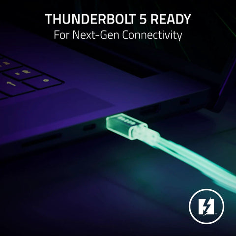 Flex Your Desk With This Thunderbolt Five Dock Offering Eleven Ports And An M2 Ssd Slot For Smooth Multi Monitors And Quick Laptop Power Ups That Never Bog Down Your Workflow, glowing cable connected to a laptop for next-gen connectivity.