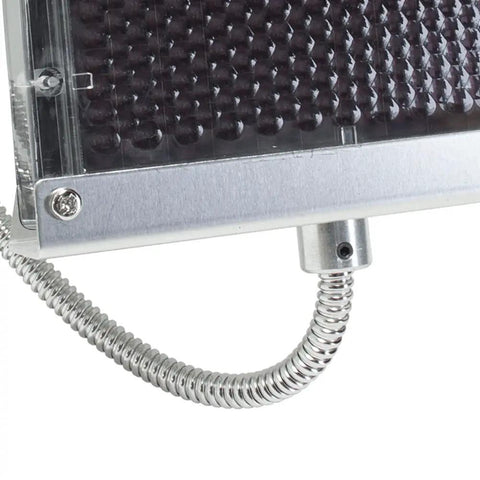 Close-up of Badass Heavy Duty 12 Volt Solar Panel Battery Charger For Deer And Game Feeders, showing aluminum mounting and flexible conduit.