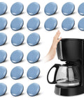 Heavy Duty Self Adhesive Appliance Sliders For Kitchen Counters next to a coffee maker, showcasing grey composite pads and setup.