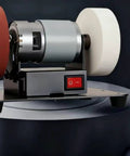 Damn Near Perfect Compact Workbench Featuring Ball Bearing Rollers Designed For Desktop Grinding Machines and Serious Home Repair Shops Built To Crush Heavy Tasks Reliably, showing motor and abrasive discs.