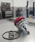 Transmission Servo Cover Actuator Assembly Featuring Tough Aluminum Housing And Comprehensive Seal Kit For Quick Gearbox Swaps And Dependable Weekend Garage Projects on a workshop table.
