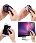 Camera cleaning kit with microfiber cloths used to wipe lens, smartphone screen, and computer monitor.
