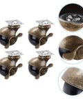 Vintage Brass Caster Set Offering Heavy Duty Swivel Furniture Wheels with black wheels and metal plates for strong support.