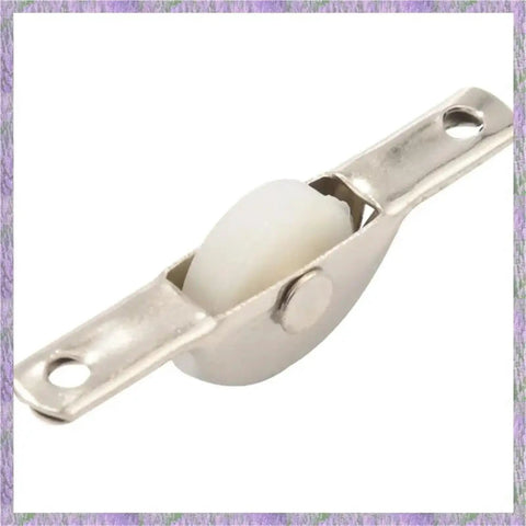 Smooth As Butter 80 Piece Complete Set Flanged Track Wheels For Doors And Drawers Single Nylon Sliding Roller Pulleys Silver close-up of roller pulley.