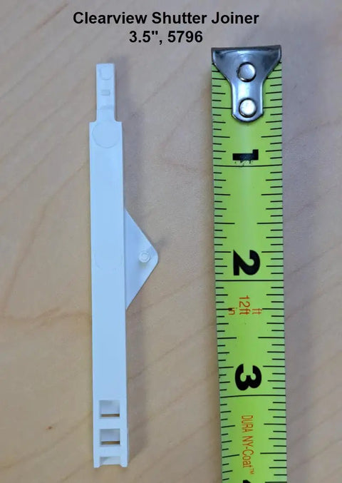 Clearview Shutter Joiner 3.5 inches next to a measuring tape for scale, part of the Quick Fix No Sweat Super Slick Shutter Joiners Repair Kit.