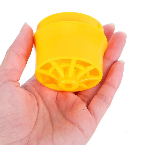 Yellow PVC pipe threading tool attachment held in hand, part of Toddmomy Electric Pipe Threader Kit Compat With Manual Power Drill.