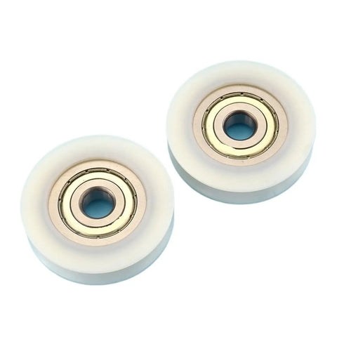 10 Piece U Groove Nylon Pulley Wheel With Precision Ball Bearings 12 By 60 By 14 Millimeter Track Guide Roller view showing two wheels with steel ball bearings.