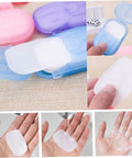 Grab and Go Disposable Soap Sheets Set showing paper soap in colorful boxes and lathered on hands