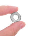 M6 Serrated Spring Washers Locking Stainless Steel 40 Piece Set Rust Resistant held between fingers to show size and serrated detail.