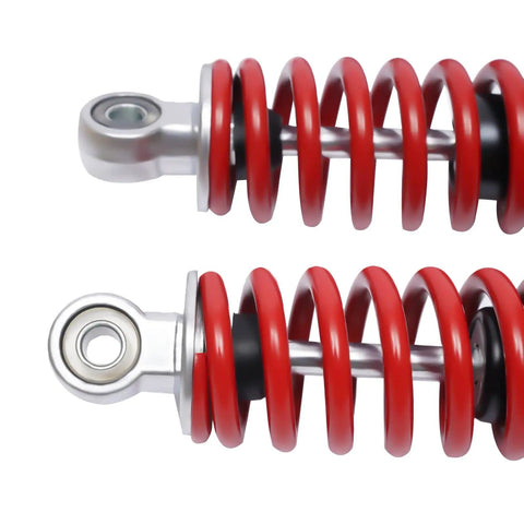 Close-up of red shocks from Heavy Duty Front Suspension Arm Assembly Kit For Go Karts And ATVs Upper And Lower Swingarm Suspension Kit