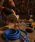 Badass 100 Foot Extension Cord With Glowing Lighted Ends Heavy Duty 10 Gauge Wire for powering tools in a workshop.