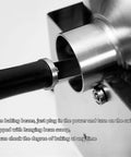 Built Tough Electric Coffee Bean Roaster Featuring Precision Thermometer Probe and Heavy Duty Stainless Steel Construction. Close-up of bean scoop.