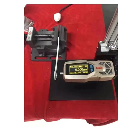 Straight Up Precision Handheld Digital Surface Roughness Tester And Portable Profilometer on a workbench with digital display.