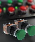 Green Emergency Stop Push Button Switch 22mm Mushroom Head Spring Return 2-Pack close-up view on industrial control panel.