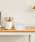 Heavy Duty Clear Tape That Really Slaps For Crafts Wall Mounts Zero Residue Easy Peel Stick Fix on a desk next to a laptop.