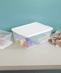 Stackable Clear Plastic Storage Bins 16 Quart 24 Pack holding craft supplies on a table, displaying organization potential.