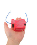 Straight Up Automatic Car Fire Extinguisher With Adhesive Mount For Rv Marine And Pickup Trucks held in hand showing compact size and design.