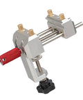 Compact Table Vise With Clamp Base For Tiny Workspaces, Center Screw Control, Guide Track, And Tabletop Part Holder For Close Detail Jobs On Your Busy Bench silver metal clamp-on vise with red handle