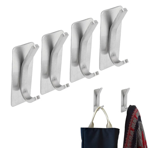 Ditch The Drilling Drama With These Four Heavy Duty Adhesive Hooks Locking Your Coats And Hats Down With Solid Grip On Tile Glass Or Paint Using Shiny Stainless Steel Silver Storage Hooks with bags and coats