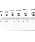 Sickly Smooth One Thousand Piece Four Millimeter G200 Grade Number 201 Stainless Steel Ball Bearings displayed next to a ruler.