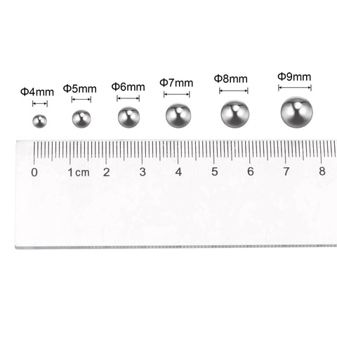 Sickly Smooth One Thousand Piece Four Millimeter G200 Grade Number 201 Stainless Steel Ball Bearings displayed next to a ruler.
