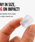 Clean Hidden Acrylic Standoff Mounts For Plexiglass Wall Signs With No Sweat Install Kit UV Stable Heavy Duty Clip In Holders 100 Pack - clear holder held between fingers.