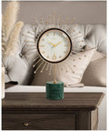 Modern Marble Desktop Clock With 18K Gold Plated Frame Super Quiet Battery Sweep Movement on wooden table.