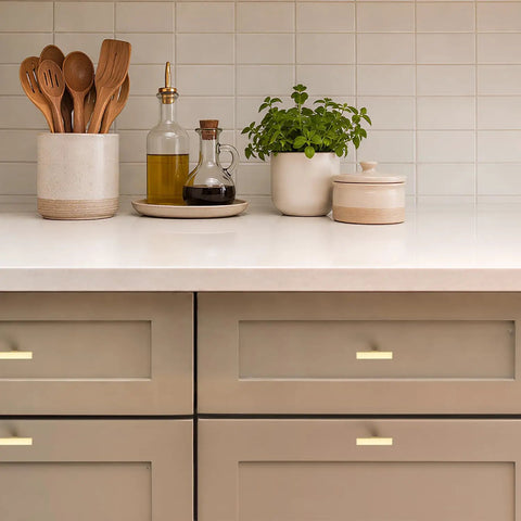 Top Shelf Brushed Gold Cabinet Handles Hella Sturdy Single Hole Drawer Pulls Two Inch Long Solid Zinc Hardware No Nonsense Thirty Pack on kitchen drawers.