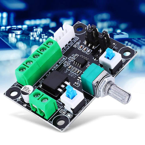 Stepper motor controller board, front view; green terminal blocks, blue jumpers, PCB with mounting holes
