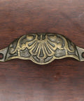 Prime Sleek Distressed Antique Brass Seashell Cabinet Pulls 8 Piece Set embossed handle from above, showing intricate design and finish.