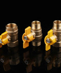 Rock Solid Brass Ball Valve With Comfort Grip Handle And No Sweat Male Female Threads For Quick Diy Plumbing Fixes, three valves with yellow handles.