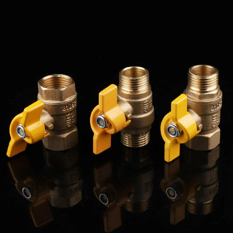 Rock Solid Brass Ball Valve With Comfort Grip Handle And No Sweat Male Female Threads For Quick Diy Plumbing Fixes, three valves with yellow handles.