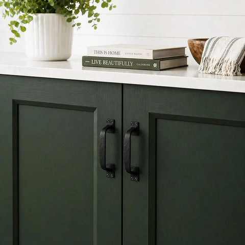 Dang Sturdy Six Inch Black Wrought Iron Cup Bin Pull Cabinet Handles With Rust Proof Powder Coat Finish on green cabinet doors.