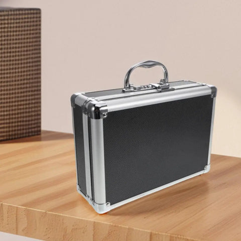 Rock Solid Hardcore Aluminum Rolling Tool Box With Secure Lock And Sturdy Grab Handle Lightweight Portable Design for mechanics on wooden table.