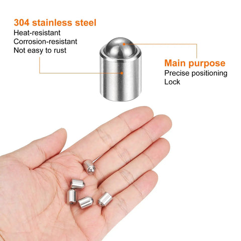 Hand holding five pieces of 5 Piece Set 8Mm X 9Mm Stainless Steel Ball Spring Plungers 40N Force No Step Positioning Latch for Cabinets.