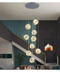 Modern Stair Chandelier Pendant Lights Indoor Lighting Ceiling Lamp for Living Room Indoor Lighting with cascading glass spheres.