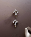 Drywall Anchors Kit 50 Pieces With Butterfly Anchors And Screws For Secure Mounting displayed on textured surface