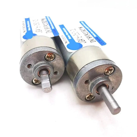 Smooth Operator DC Gearmotor For Diy Builds And Rc Car Mods Featuring Planetary Speed Reducer Cw Ccw Toggle Switch 6V 12V side view of two gearmotors with metal casing and shafts