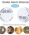 Zero Headache 10 Year Battery Smoke Detector And Alarm With Photoelectric Sensor For House And Bedroom Safety Straight Up Dependable Bulletproof 2 Pack Ul217 Certified, two white smoke detectors side by side.