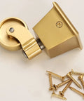 Heavy Duty Brass Caster Wheels For Furniture Slick Polished Gold Vintage Casters Roll Smooth As Silk With 360 Degree Swivel Rotation Rock Solid Square Cup Mount and screws laid out beside single brass wheel.