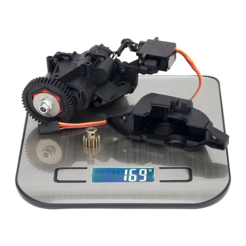 2Speed Transmission Gearbox With Internal Gears And Servo For One Tenth RC Crawler Car TRX4 TRX6 on a scale showing weight