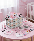 Dope Boo Halloween Basket For Kids With Pink Bow Glowing Ghost Canvas Trick Or Treat Tote Sweet Candy Storage Bin with toys on pink table.