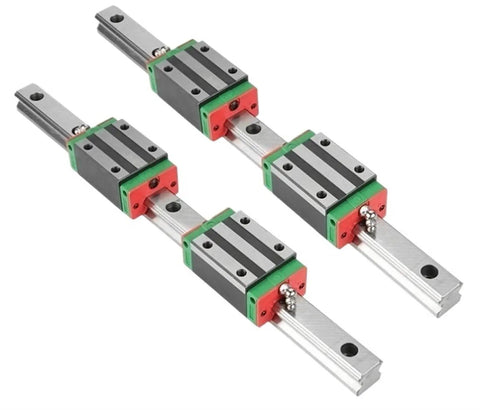 Rock Solid HGR30 Linear Guide Rail Kit With Four HGH30CA Slider Blocks For Boss Grade CNC Router Projects Featuring Heavy Duty Bearing Steel Construction And Buttery Smooth Accuracy, showing four slider blocks on rails.