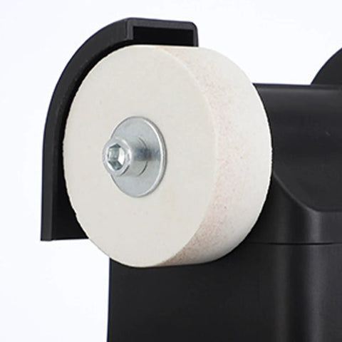 Close-up of Compact Tabletop Mini Bench Grinder Featuring Dual Grinding Wheels for Precision Tool Sharpening, white grinding wheel detail.