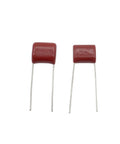 Two Heavy Duty CBB22 Capacitors, 400V 0.1 Microfarad 104J, red metallized polypropylene film, used for circuit builds.